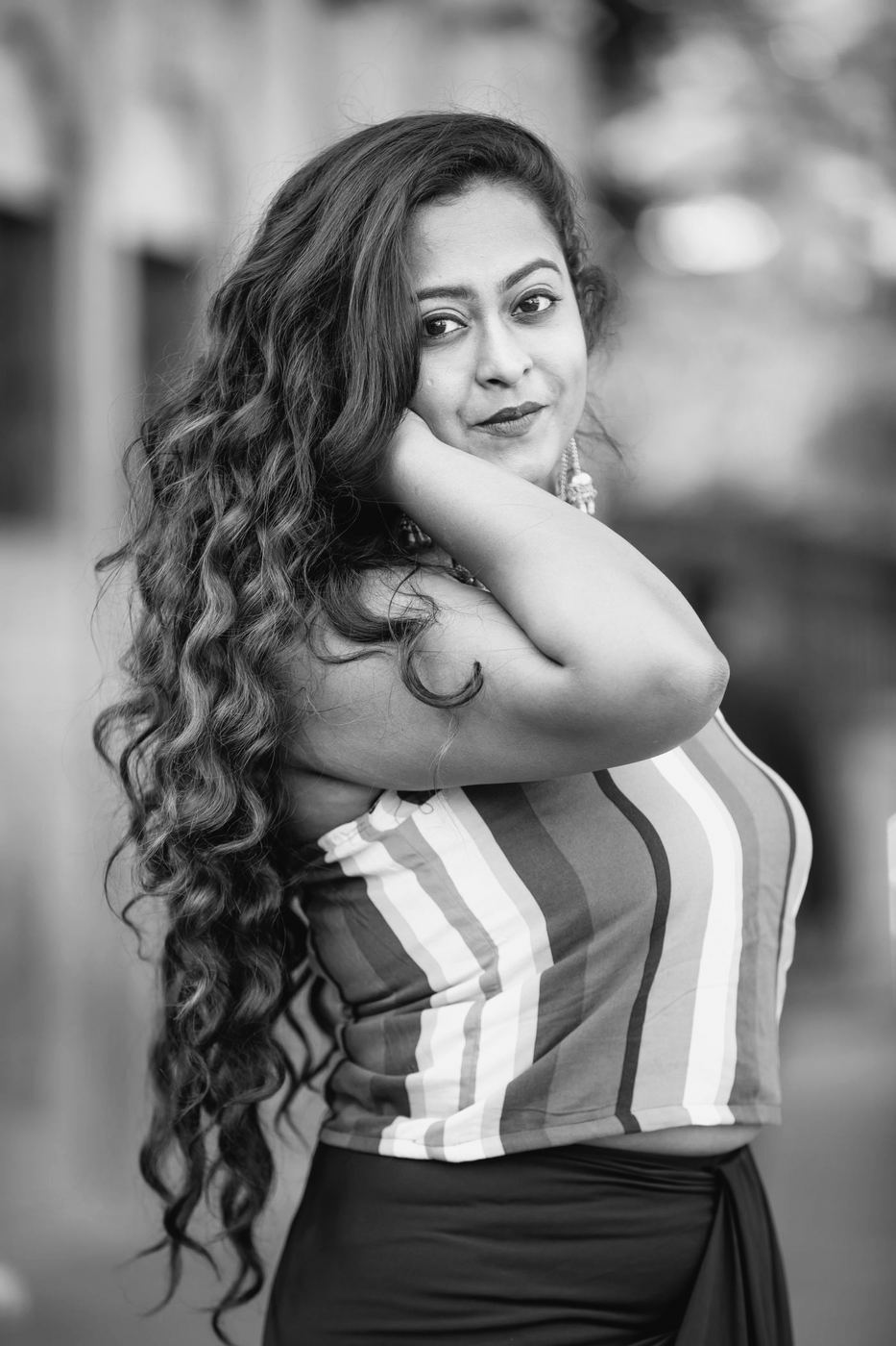 Woman with long, curly hair